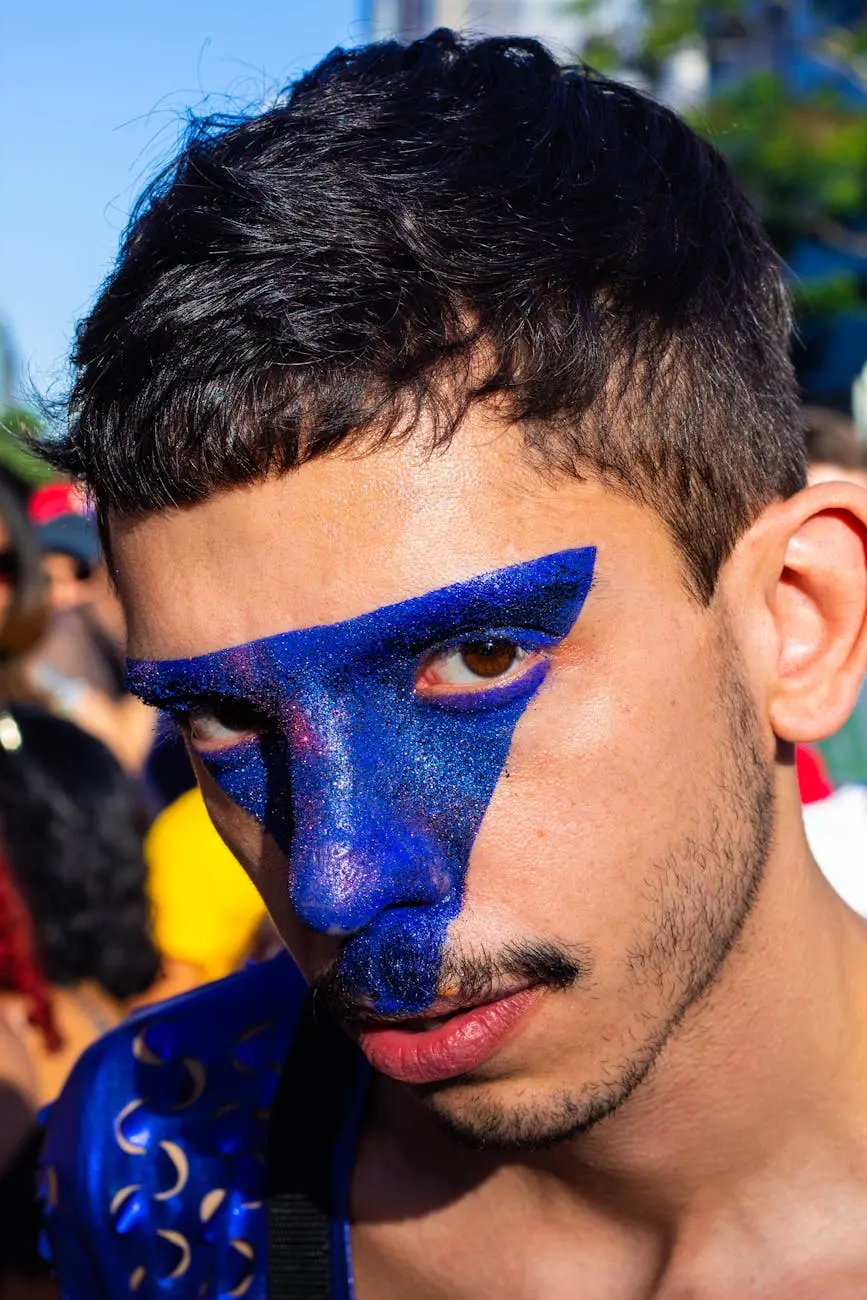 Close-up portrait of a young man with blue artistic face paint at an outdoor event in São Paulo.