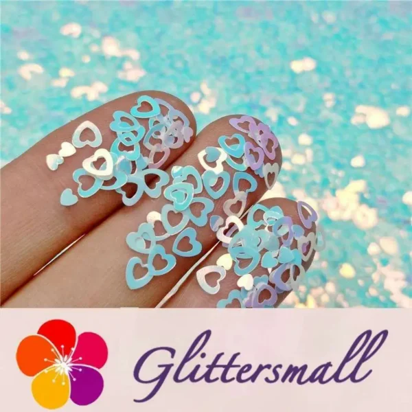 IMG_20191102_160524_93fa679a-00cd-4e12-b5ef-0af07c6cab5b.webp 4mm Hollow Out Heart Shaped Dream Blue Iridescent Glitter C021R
